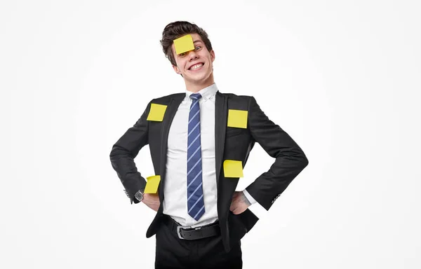 Funny manager in sticky notes in studio — Stockfoto