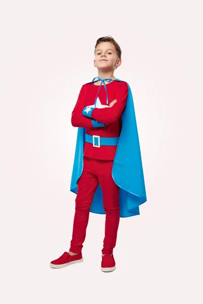 Proud superhero child in studio — Zdjęcie stockowe
