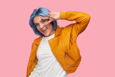 Merry woman gesturing V sign