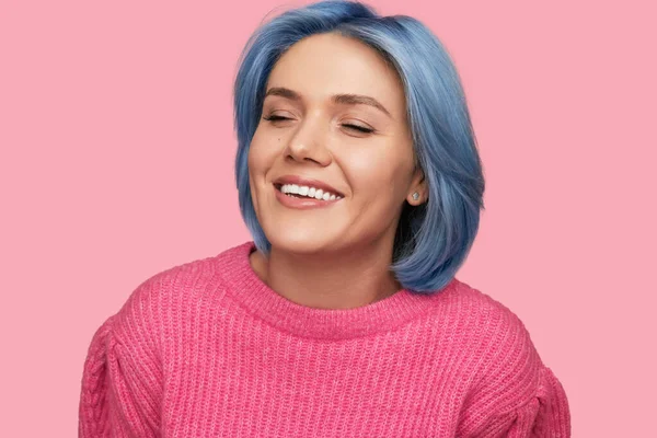 Trendy woman with blue hair in studio — Stock Fotó