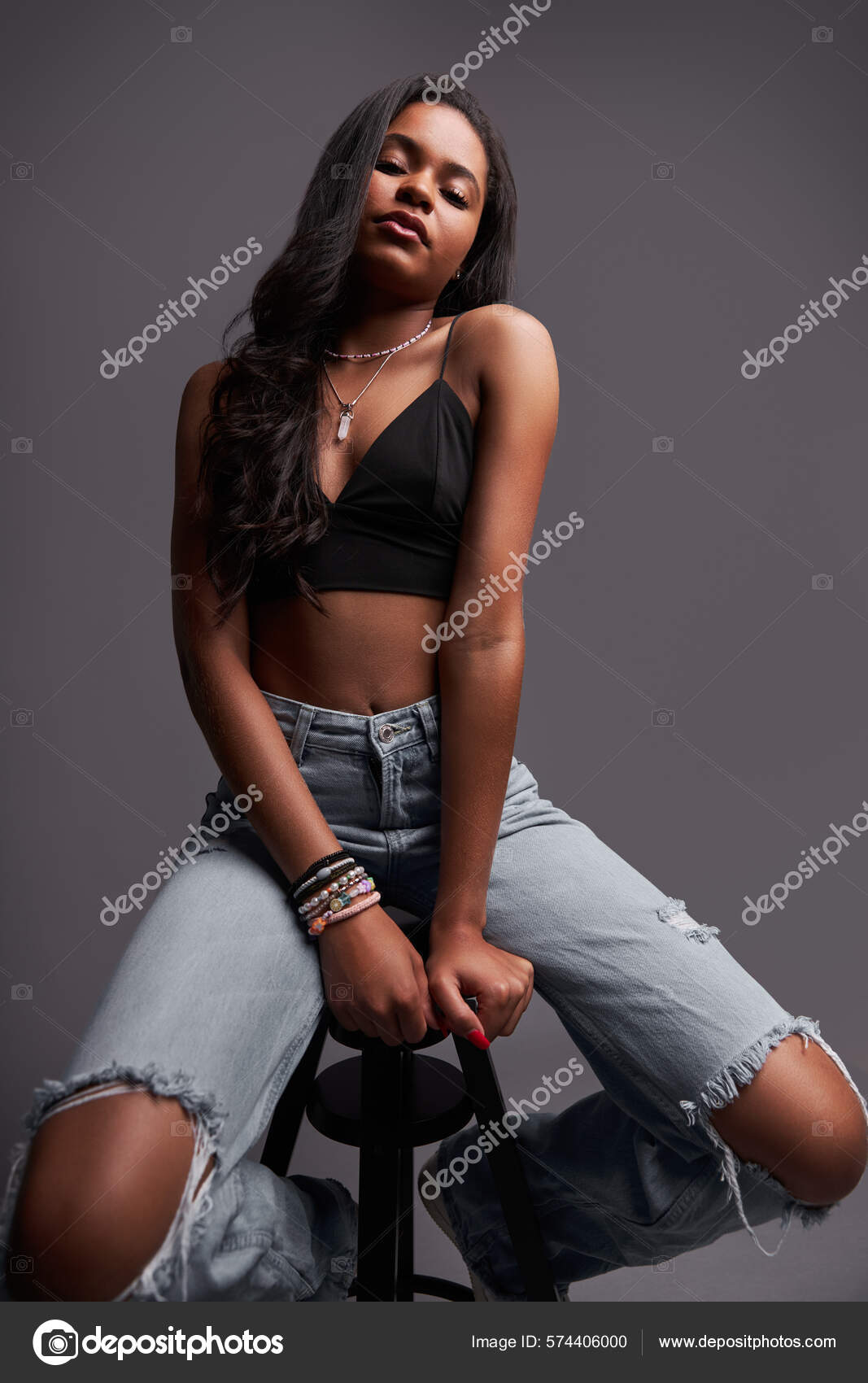 Attractive Young Hispanic Female Trendy Jeans Bra Sitting Stool Gray Stock  Photo by ©kegfire 574406000