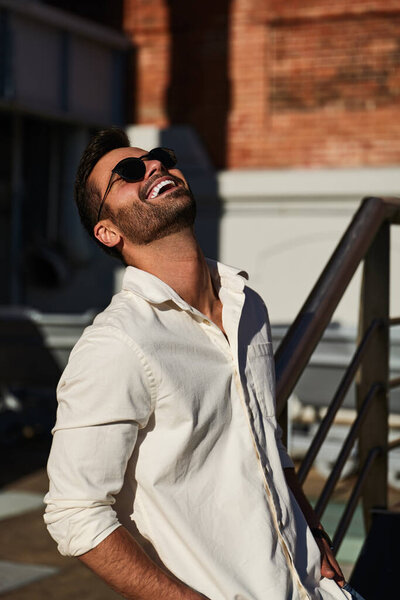 Optimistic Young Unshaven Ethnic Guy Dark Hair Stylish Outfit Sunglasses Stock Image