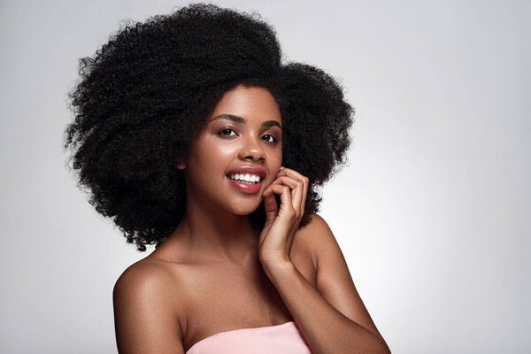 Self Assured Young Black Female Model Dark Afro Hair Bare Stock Picture