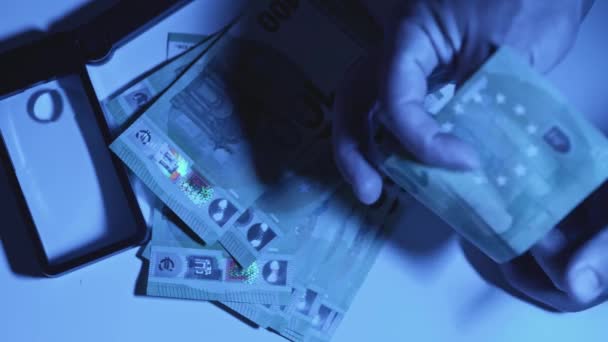 Hundred Euro Bill Studied Ultraviolet Light Checking Counterfeit Money Authenticity — Stock Video