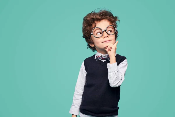 Clever Little Student School Uniform Glasses Touching Face Looking Away — Stockfoto