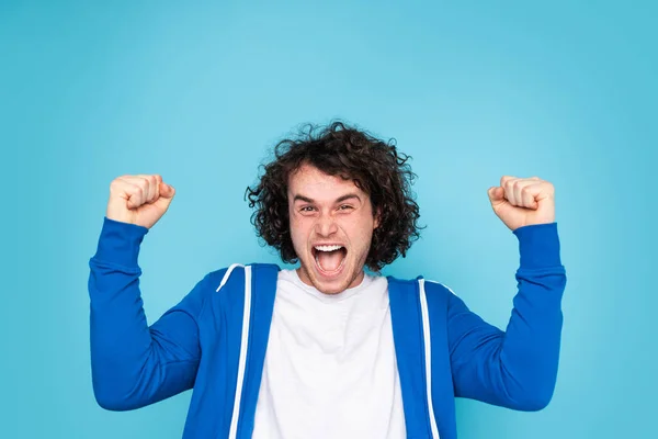Excited Young Male Curly Dark Hair Casual Clothes Clenching Fists — ストック写真