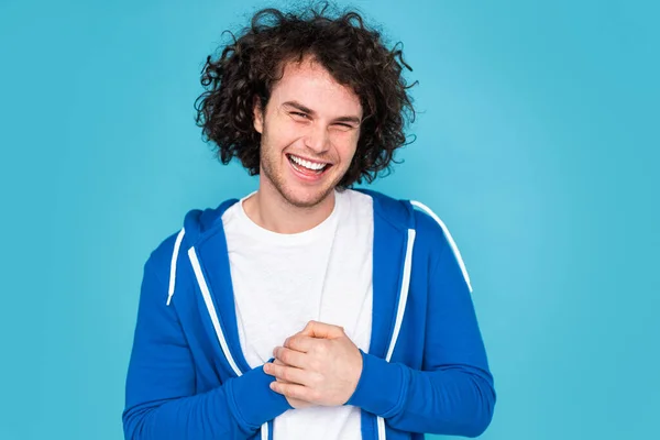 Delighted Young Unshaven Man Curly Dark Hair Casual Clothes Smiling — Stock Photo, Image