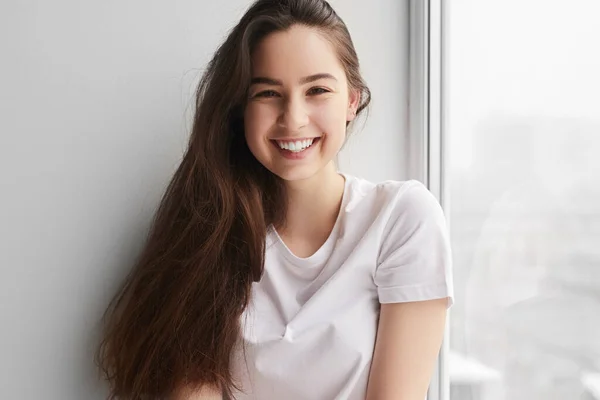 Positive Female Teenager Long Dark Hair Smiling Looking Camera While — 스톡 사진