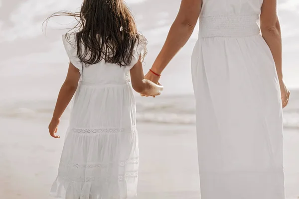 Back View Crop Anonymous Mother Daughter White Dresses Holding Hands — Φωτογραφία Αρχείου