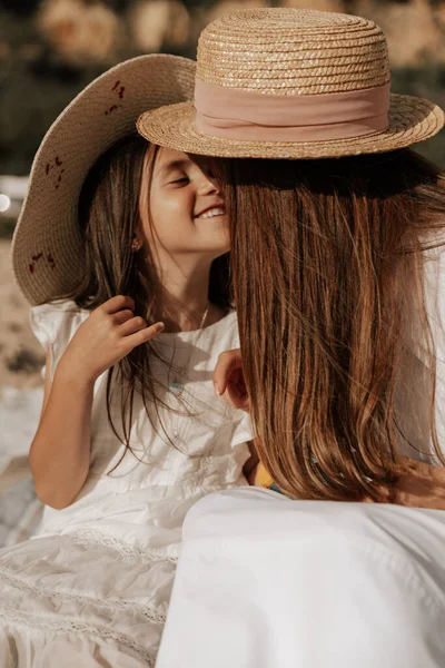 Cheerful Child White Dress Straw Hat Smiling Touching Noses Mom — Fotografia de Stock