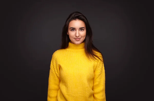 Positive Hispanic Young Female Yellow Sweater Smiling Looking Camera While — Stok fotoğraf