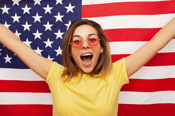 Cheerful Young Female Yellow Shirt Sunglasses Shouting Happily Looking Camera — Stok fotoğraf