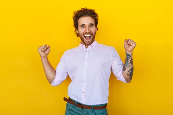 Cheerful Young Man Smart Casual Clothes Tattooed Arm Clenching Fists — 스톡 사진