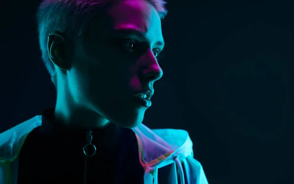 Young Futuristic Woman Looking Away Colorful Neon Light Black Background — Fotografia de Stock