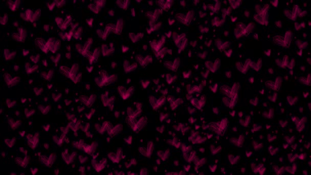 Розовый меняет сердца на черном фоне. — стоковое видео