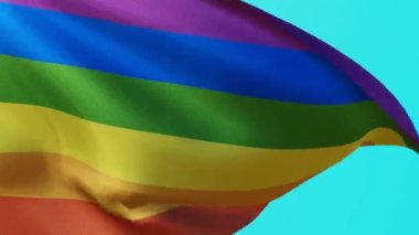 Mavi ekranda LGBT topluluğunun el sallayan bayrağı. Dokuma dokusunda gökkuşağı renkleri olan seks azınlıklarının sembolü. 3B grafikli 4K stok videosu.