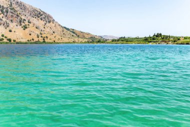 Mountain lake with turquoise water. Beautiful mountain landscape with a lake. High quality photo
