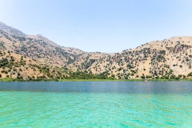 Mountain lake with turquoise water. Beautiful mountain landscape with a lake. High quality photo