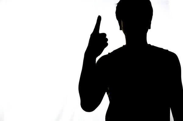 Silhouette of a man's hand thumbs up. hand symbol concept