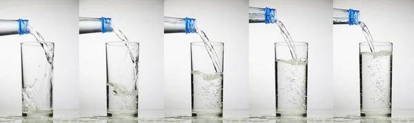 Vidro Está Enchendo Com Água Coleta Respingo Água Fundo Branco — Fotografia de Stock