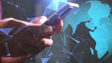 Concept of mobile phone usage and data communication. The man is constantly touching the phone screen.