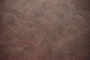 Kahverengi derinin soyut desenli arka planı.