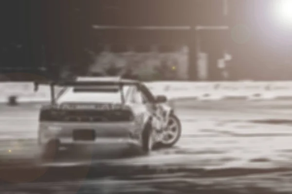 Lens blur of car racing. car race background concept