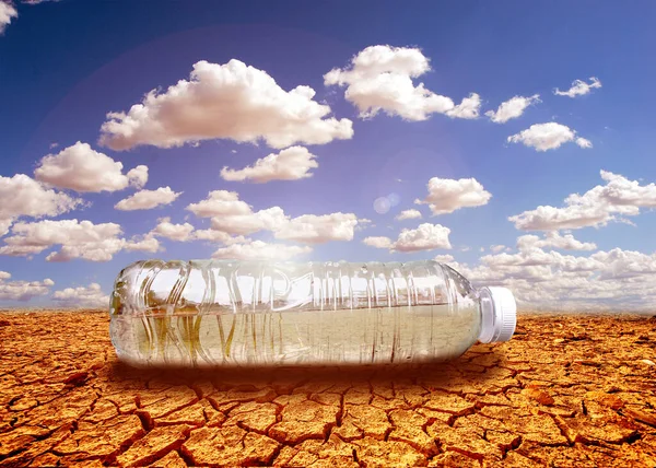 water scarcity concept Drought due to global warming. Water bottles placed in drought and broken soil areas