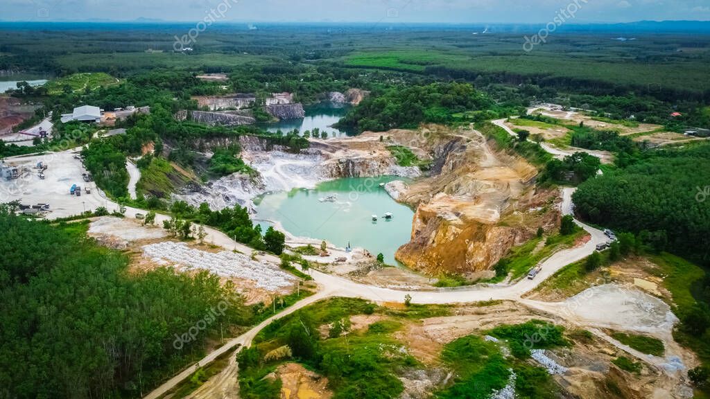 aerial photograph of a large pit of a gypsum mine. A large gypsum mine