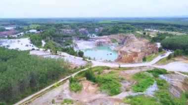 aerial view of a large pit of a gypsum mine. A large gypsum mine. Mining and Geology Industry Concepts