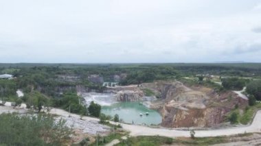 aerial view of a large pit of a gypsum mine. A large gypsum mine. Mining and Geology Industry Concepts