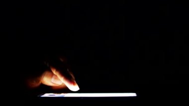 side view Man's hands using smartphone to search for information