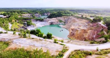 aerial view of a large pit of a gypsum mine. A large gypsum mine. Mining and Geology Industry Concepts