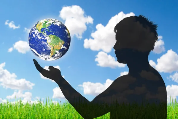 Love the earth and protect the environment concept. Earth day. Earth in people's hands.