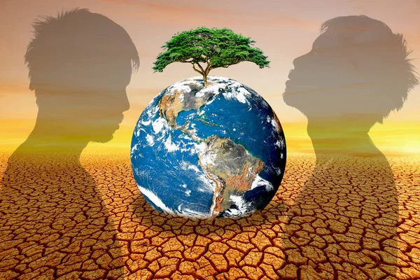 The concept of loving the earth, protecting the environment, changing the environment. globe on a barren land