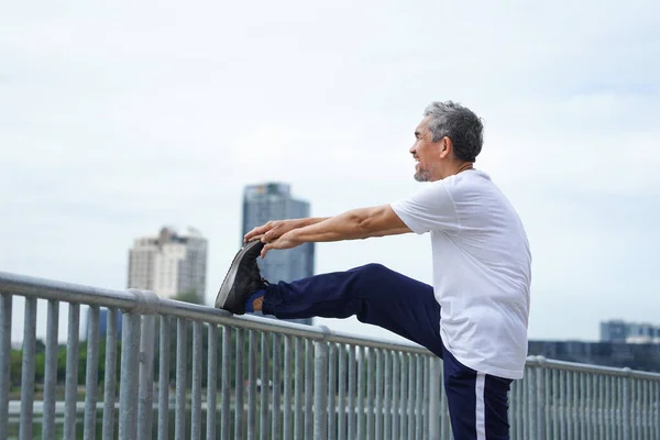Happy Senior Man Grey Hair Stretching Legs City Park Old — Fotografia de Stock