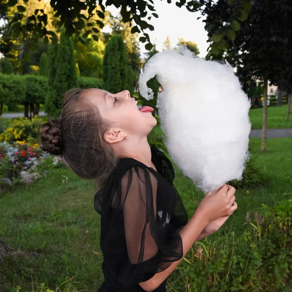 Cute Girl Eats Delicious Cotton Candy Has Fun Park Happy Fotografias De Stock Royalty-Free