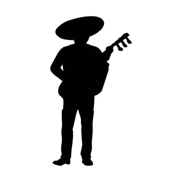 Siluet Meksikalı adam büyük gitar gitaronu çalıyor.