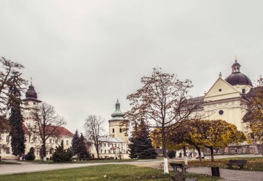 The town of Zhovkva is a medieval square of the church. Autumn historical landscapes photo clipart