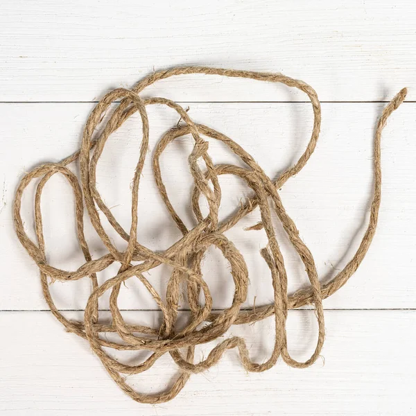 Twine Tangled White Wooden Surface — Stock Photo, Image