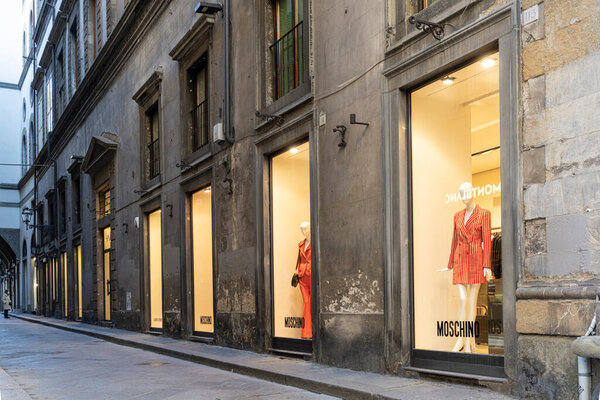 Florence, Italy. January 2022. the view of the windows of the Moschino brand store in the city center