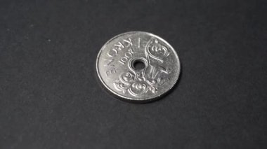 1 Norwegian Krone coin isolated on a grey background