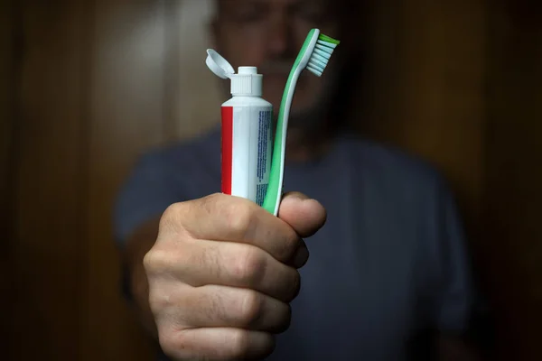 Man Toothbrush Tube Toothpaste His Hand — Stockfoto
