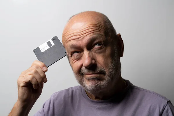 Man Old Floppy Disk His Hand — Stockfoto