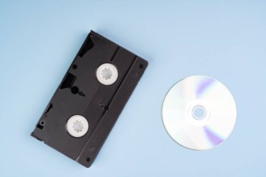 An old VHS videotape and a CD