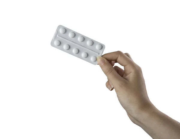 Blisterförpackning Med Piller Den Kvinnliga Handen Vit Bakgrund — Stockfoto