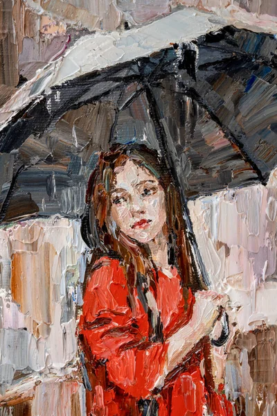 .Girl in the rain with an umbrella in her hands. — Stock Photo, Image