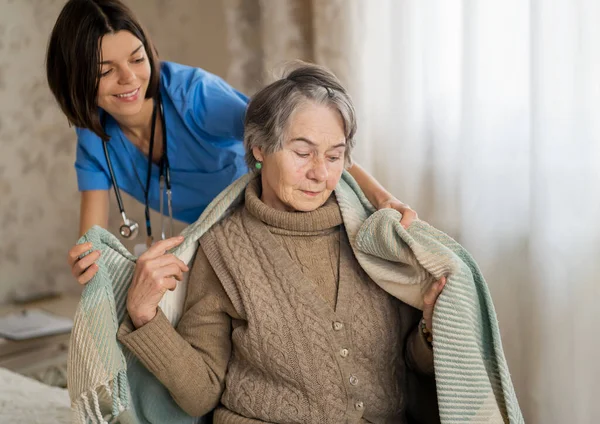 Happy retired woman and trust between doctor and patient. — Stock Photo, Image