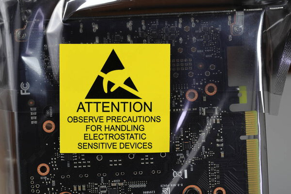 Close up detail of yellow label on anti static package or esd bag for IT equipment.