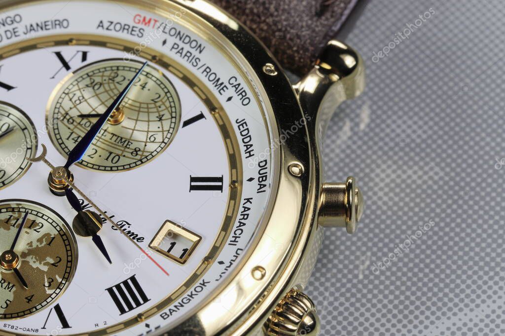 close up shallow focus Time zone cities code on luxury world time watch bezel on Bangkok time. 2023